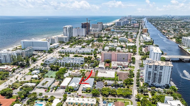 drone / aerial view with a water view and a view of city