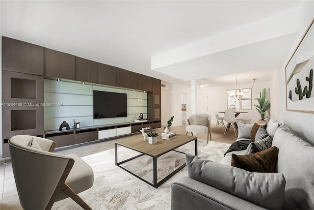 tiled living room featuring an inviting chandelier