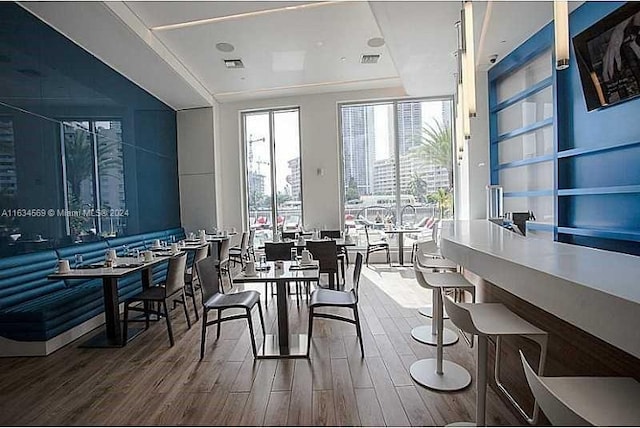 dining area with hardwood / wood-style flooring