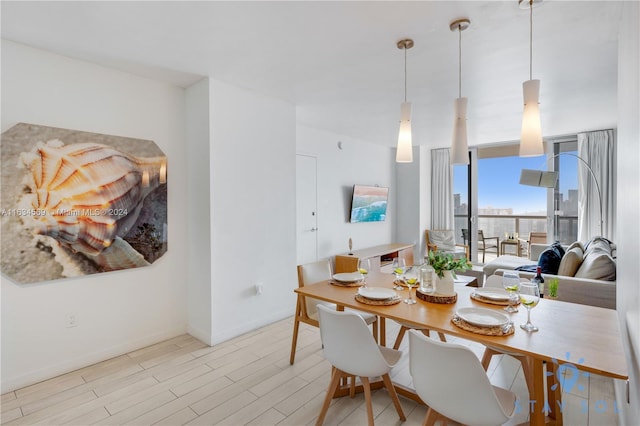 dining space featuring light hardwood / wood-style flooring