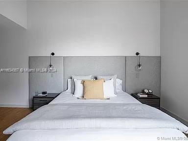 bedroom featuring hardwood / wood-style floors