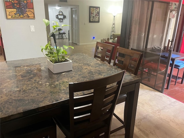 view of tiled dining area