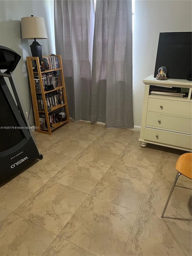 interior space featuring light tile patterned flooring