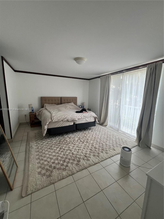 tiled bedroom with access to exterior