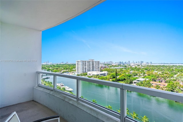 balcony featuring a water view