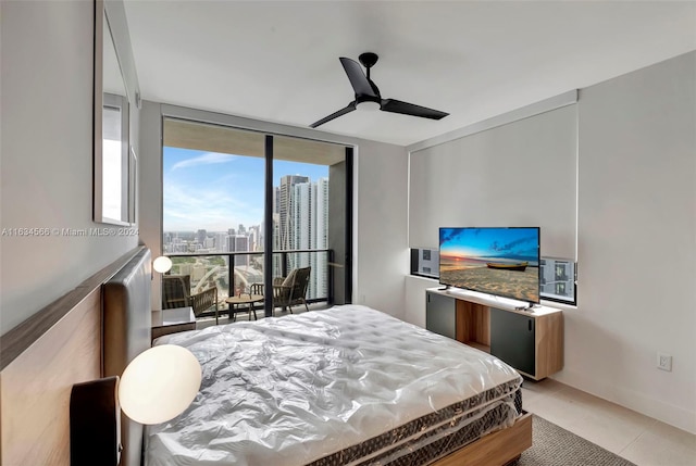 tiled bedroom with ceiling fan