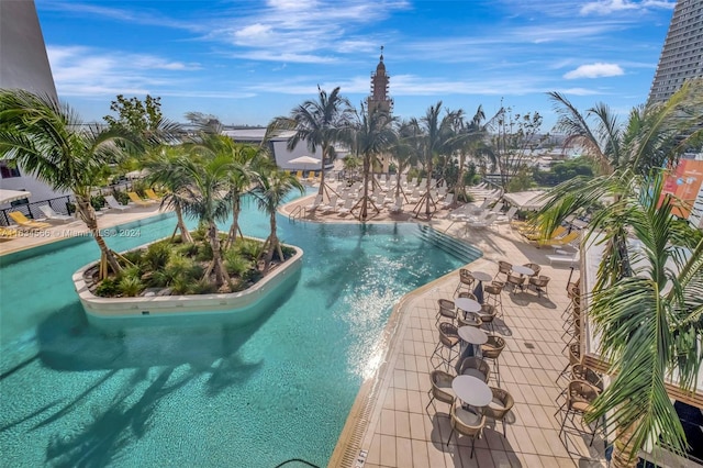 view of swimming pool featuring a patio area