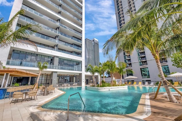 view of swimming pool featuring a patio