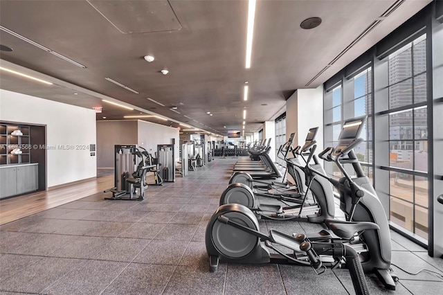 gym featuring hardwood / wood-style floors