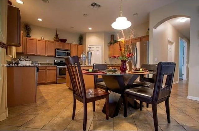 view of tiled dining area