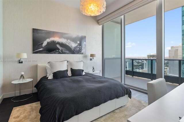 bedroom with light hardwood / wood-style flooring