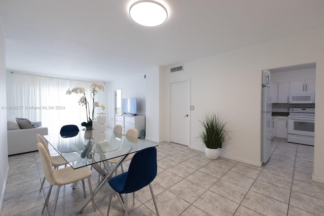 view of tiled dining space