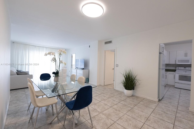 view of tiled dining room