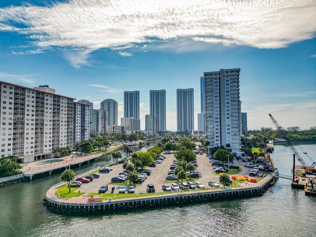 birds eye view of property featuring a water view