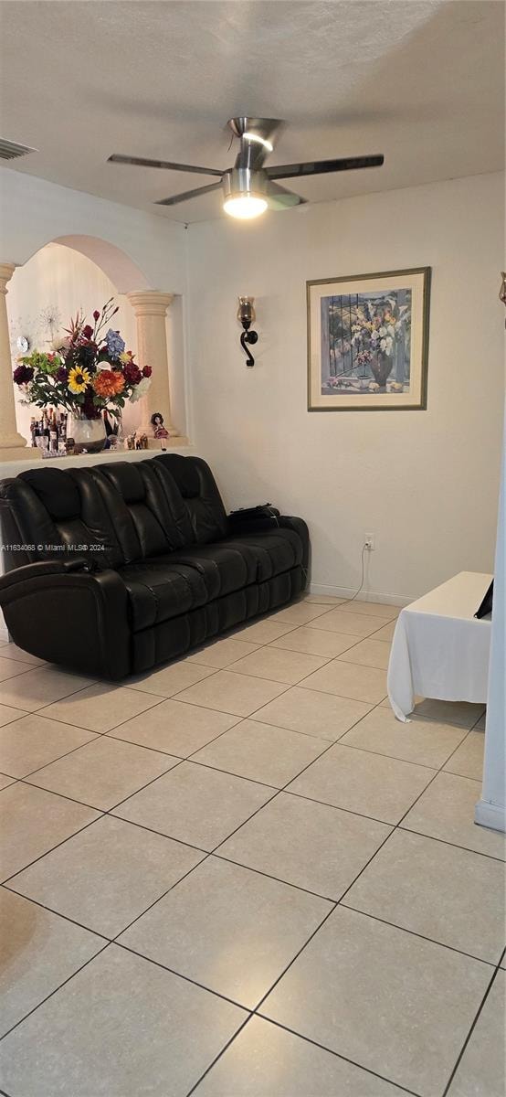 living room with light tile patterned floors