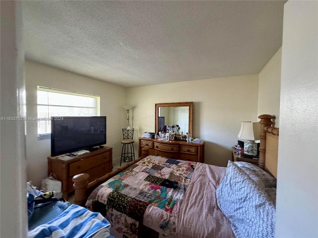 bedroom with a textured ceiling