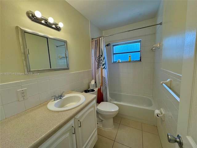 full bathroom with shower / bath combination with curtain, backsplash, toilet, vanity, and tile walls