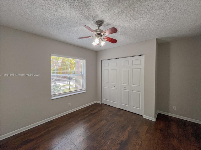 unfurnished bedroom with a closet, a textured ceiling, ceiling fan, and hardwood / wood-style floors