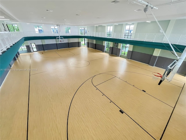 view of sport court featuring plenty of natural light