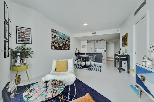 living room with light tile patterned floors