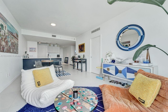 living area with light tile patterned flooring