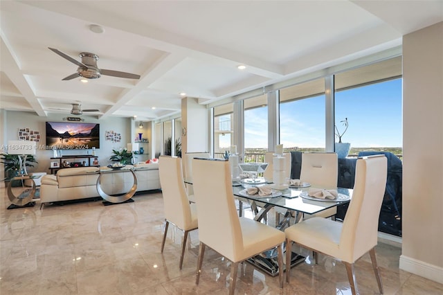 dining space with coffered ceiling, ceiling fan, and beamed ceiling