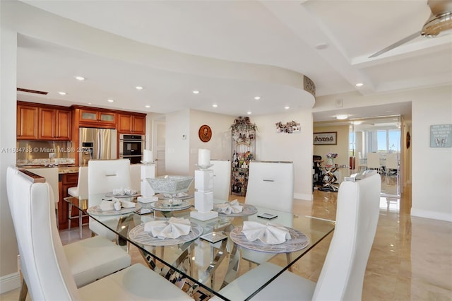 dining space with ceiling fan