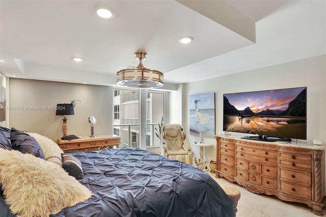 bedroom featuring light carpet