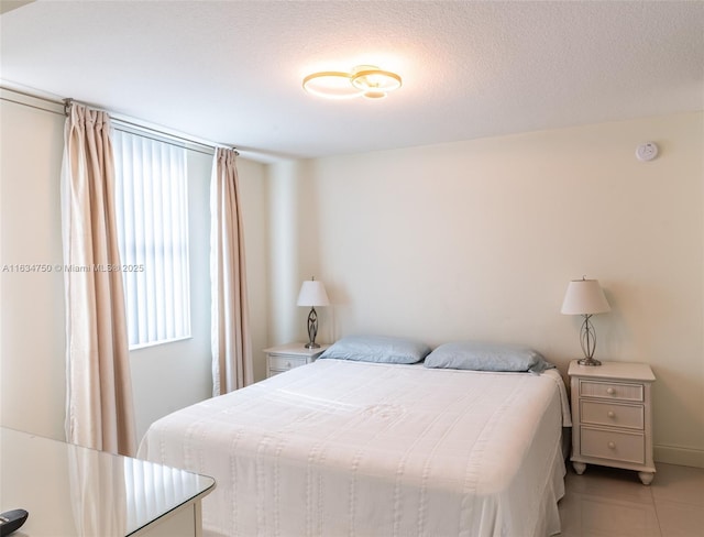 bedroom featuring a textured ceiling