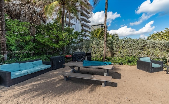 exterior space featuring an outdoor hangout area