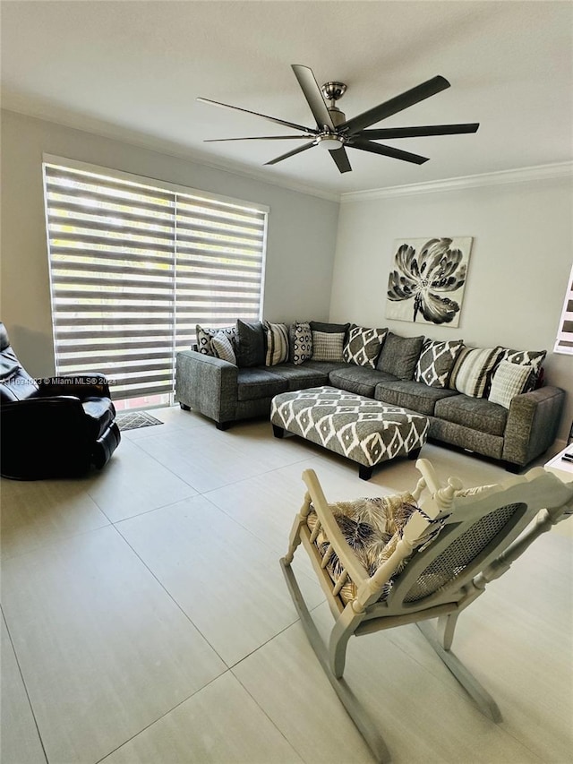 living room with light tile patterned floors, crown molding, and ceiling fan