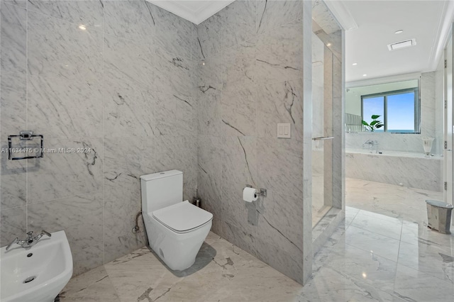 bathroom with toilet, tile walls, marble finish floor, a bath, and a bidet