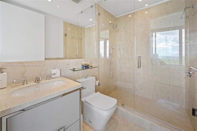 full bath featuring toilet, vanity, tile walls, marble finish floor, and a shower stall