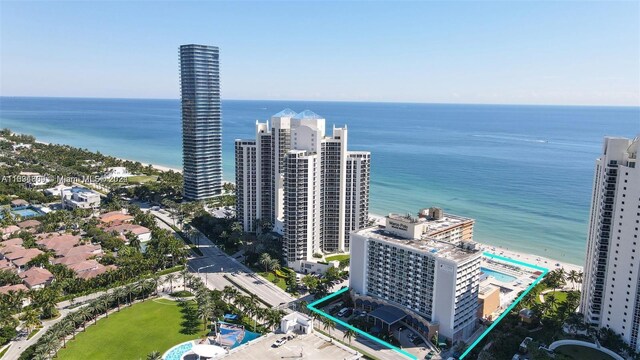 bird's eye view with a water view