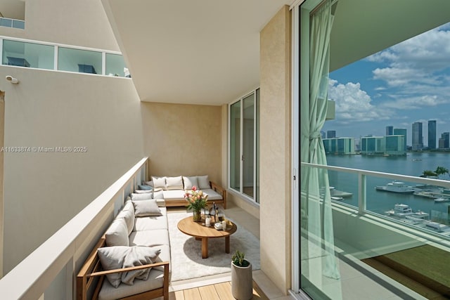 balcony featuring a water view