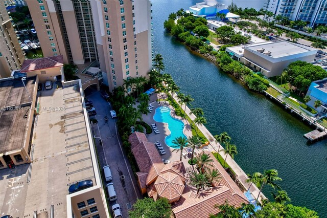 bird's eye view of a pool and a large body of water