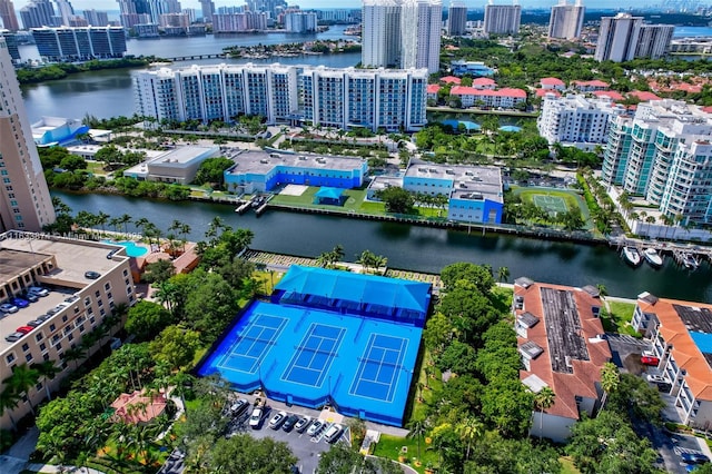 view of urban area featuring a nearby body of water
