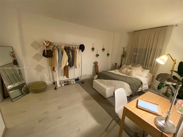 bedroom featuring wood-type flooring