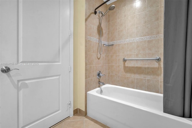 bathroom with tile patterned floors and shower / bathtub combination with curtain