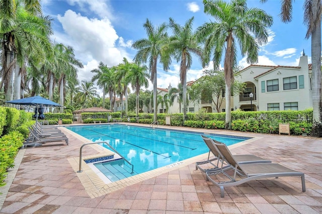 view of swimming pool featuring a gazebo and a patio area