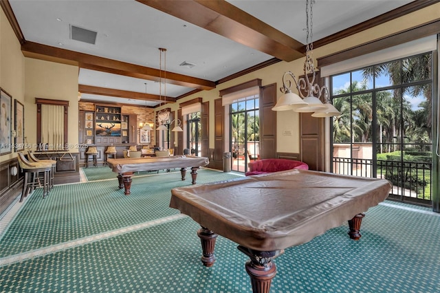 recreation room with beamed ceiling, carpet, ornamental molding, and pool table