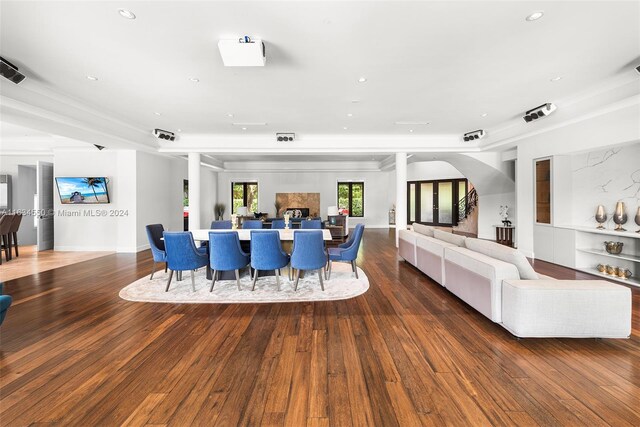 living room with recessed lighting and wood finished floors