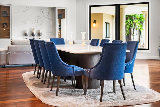 dining area with dark wood-type flooring