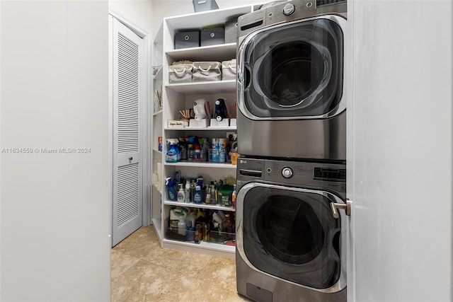 laundry room featuring stacked washing maching and dryer