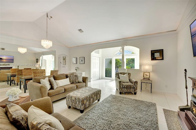 living room featuring lofted ceiling, light tile patterned floors, arched walkways, baseboards, and crown molding