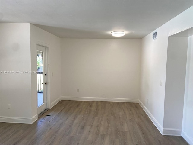 empty room featuring hardwood / wood-style floors