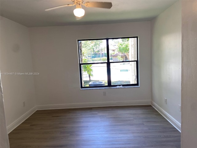 unfurnished room featuring ceiling fan and hardwood / wood-style floors