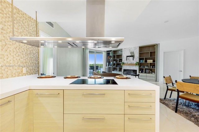 kitchen with light brown cabinets, exhaust hood, black electric stovetop, decorative backsplash, and light tile patterned flooring