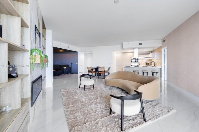 17111 Biscayne Blvd Unit 304, North Miami Beach, FL 33160 - living area with baseboards