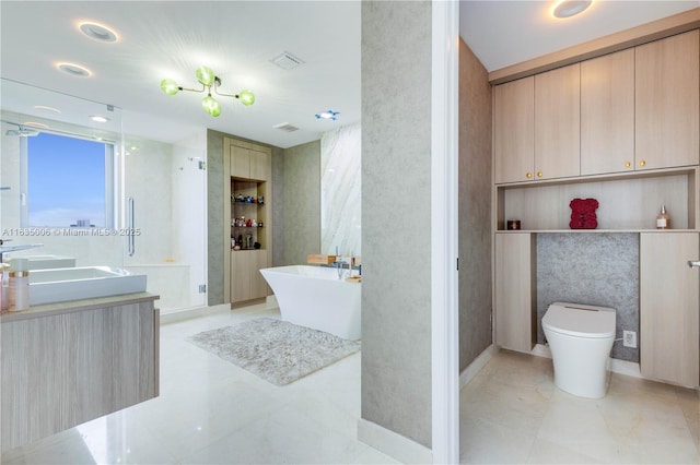 17111 Biscayne Blvd Unit 304, North Miami Beach, FL 33160 - full bath featuring vanity, a freestanding tub, and a shower stall